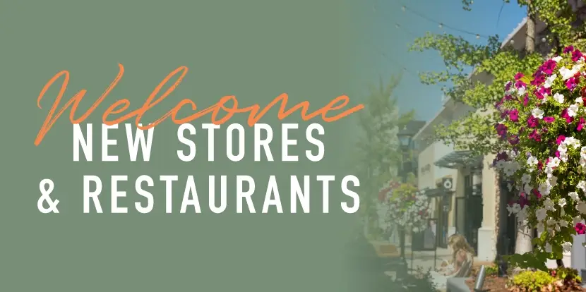 Welcome new stores and restaurants. Shopping center corridor with hanging flower baskets.